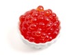 A Bowl Filled with Popping Boba on a White Background