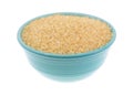 Bowl filled with turbinado sugar on a white background Royalty Free Stock Photo