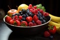 A bowl filled with a variety of fresh, nutritious fruits