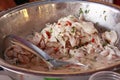 Preparing ceviche, traditional Peruvian seafood dish