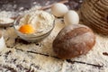 Bowl of flour with eggs and bread Royalty Free Stock Photo