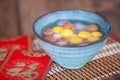A bowl of food for the Lantern Festival.The Chinese meaning in the picture is `happiness`