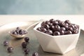 Bowl with fresh acai berries on tray Royalty Free Stock Photo