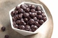 Bowl with fresh acai berries on tray Royalty Free Stock Photo