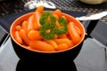 Bowl with fresh carrots