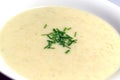 A bowl of fresh, creamy soup