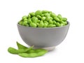 Bowl with fresh edamame soybeans and pods on background Royalty Free Stock Photo