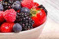 Bowl of fresh fruit. Bblackberries; raspberries; blueberries. Royalty Free Stock Photo