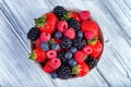 Bowl of fresh fruit. Bblackberries; raspberries; blueberries on Royalty Free Stock Photo