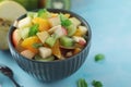 A bowl with fresh fruit salad