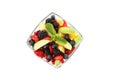 Bowl of fresh fruit salad isolated on background Royalty Free Stock Photo