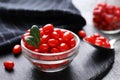 Bowl with fresh goji berries on slate plate Royalty Free Stock Photo