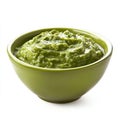 A bowl of fresh guacamole, isolated on a white background, emphasizing Royalty Free Stock Photo