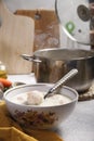 A bowl with fresh home made hot creamy soup with chiken meat bowls and a pot Royalty Free Stock Photo