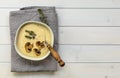 Bowl of fresh homemade mushroom cream soup on wooden table Royalty Free Stock Photo