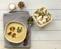 Bowl of fresh homemade mushroom cream soup on wooden table Royalty Free Stock Photo