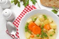 Bowl of fresh homemade vegetable soup served on white wooden table Royalty Free Stock Photo