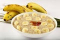 Bowl of fresh oatmeal porridge with banana