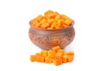 Bowl with fresh raw pumpkin pieces  on white Royalty Free Stock Photo