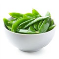 A bowl of fresh snow peas, isolated on a white background, emphasizing Royalty Free Stock Photo