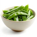 A bowl of fresh snow peas, isolated on a white background, emphasizing Royalty Free Stock Photo