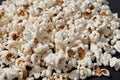 a bowl of freshly cooked popcorn on a black background, popcorn texture Royalty Free Stock Photo