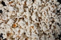 a bowl of freshly cooked popcorn on a black background, popcorn texture Royalty Free Stock Photo