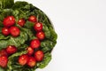 A bowl of freshly washed vegetables and fruits