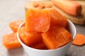 Bowl of frozen carrot puree cubes and ingredient on marble table, closeup Royalty Free Stock Photo