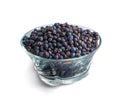 Bowl of frozen wild blueberries isolated on white background