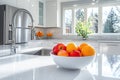A bowl of fruit on a counter in a kitchen Royalty Free Stock Photo