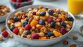 A bowl of fruit and nuts breakfast cereal, blueberries in the front with red berries on top Royalty Free Stock Photo
