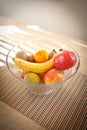 Bowl of fruit on table Royalty Free Stock Photo