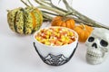 A bowl full of Halloween candy corn on a white background Royalty Free Stock Photo