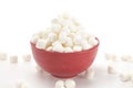 Bowl Full of Mini White Marshmallows on a White Background Royalty Free Stock Photo