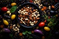 a bowl full of nuts beans and vegetables