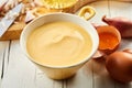 Bowl of gourmet creamy Hollandaise sauce Royalty Free Stock Photo