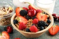 Cereal. Bowl of granola cereals, fruits and milk for breakfast. Muesli with cereals Royalty Free Stock Photo