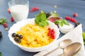 bowl of granola with yogurt and berries isolated on white background, top view Healthy tasty breakfast cornflakes with Royalty Free Stock Photo