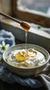 Bowl of Greek yogurt with honey drizzle Royalty Free Stock Photo