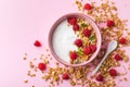 Bowl with greek yogurt, raspberries and granola. Top view flat lay. Healthy food, snack, breakfast