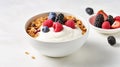 A bowl of Greek yogurt topped with granola, mixed berries, and a drizzle of honey Royalty Free Stock Photo