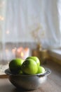 Green Apples, Book and Candle Royalty Free Stock Photo