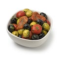 Bowl with green and black olives, peppers and tomatoes Royalty Free Stock Photo