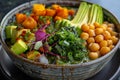 Bowl of green gazpacho with avocado and curcuma roasted chick peas