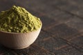 A Bowl of Green Tea Matcha Powder on a Woodn Table Royalty Free Stock Photo