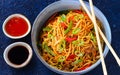 Bowl of Hakka noodles with chopsticks