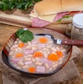 Bowl of Ham and Bean Soup With Carrots Royalty Free Stock Photo