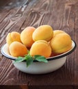 Bowl of harvested apricots