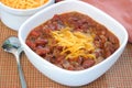 Bowl of Homemade Chili with Shredded Cheddar